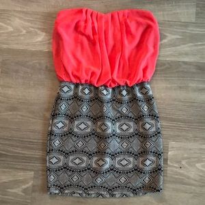 Pink, black and white strapless dress